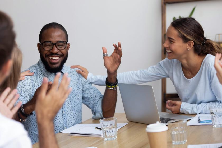 An academic manager discusses challenges with colleagues